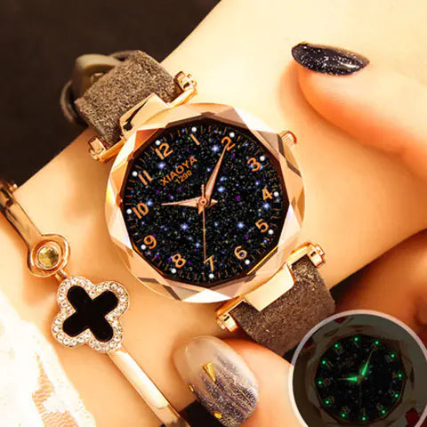 Reloj de cuarzo para mujer con diseño de estrellas luminosas