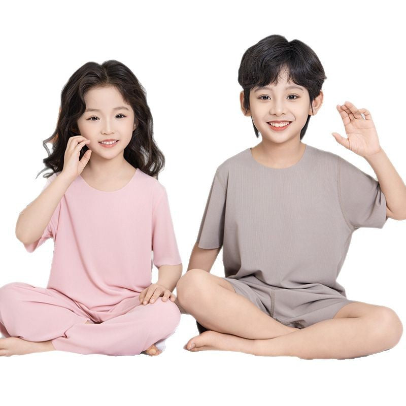Summer New Style Boys' Short-Sleeved Loose Seamless Ice Silk Home Clothes Children's Two-Piece Set Girls' Pajamas Set Wholesale
