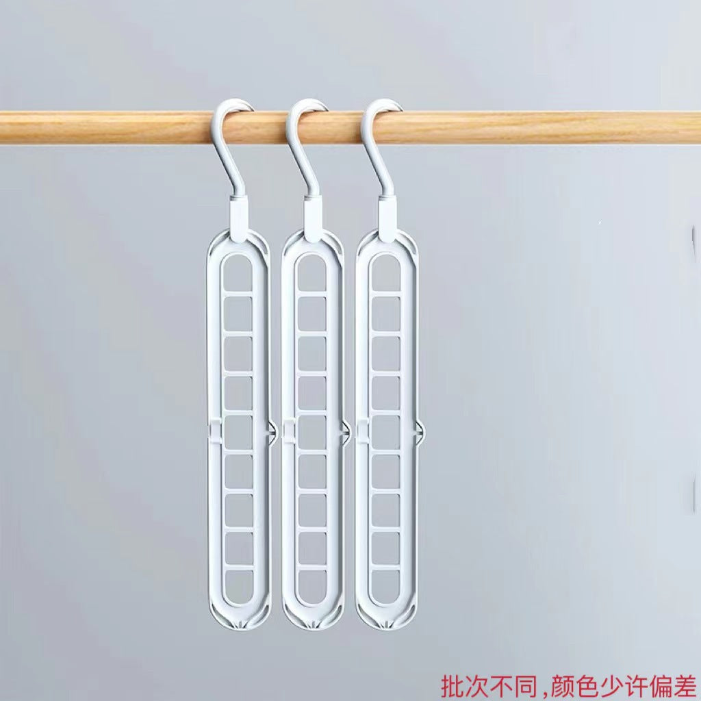 Multifunctional Magic Hanger, Foldable with Nine Holes, Space-Saving for Home Use, Suitable for Wardrobes, Closets, Dormitories, and Rotatable Storage Hanger