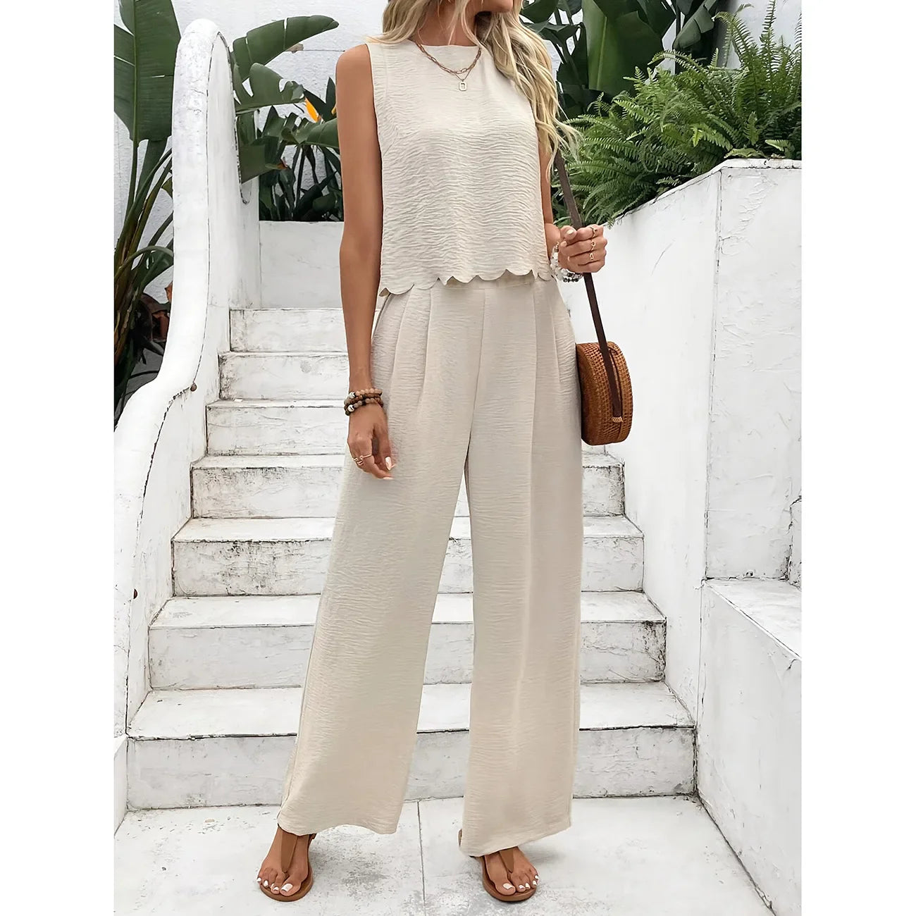 Casual set, wide pants, sleeveless blouse, open back with tie, detail on the hem of the blouse