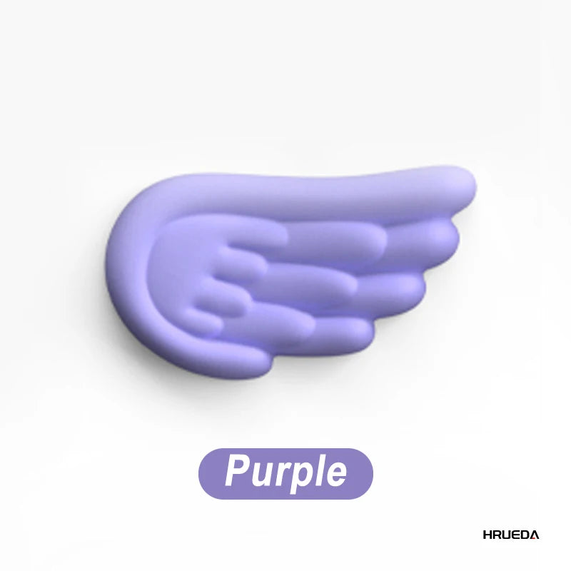 wing shaped wrist pad
