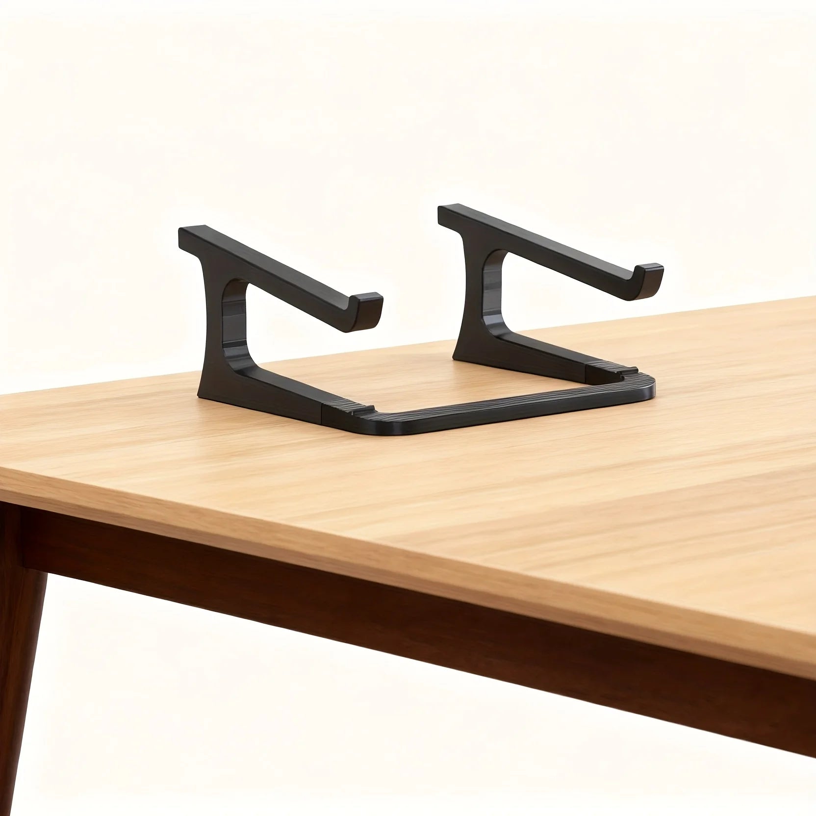 A Laptop Stand That Elevates for Better Cooling, Is Detachable, And Easy to Carry.