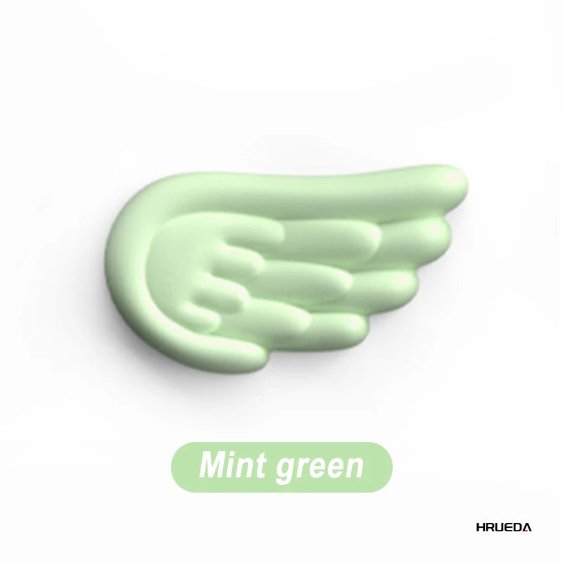 wing shaped wrist pad