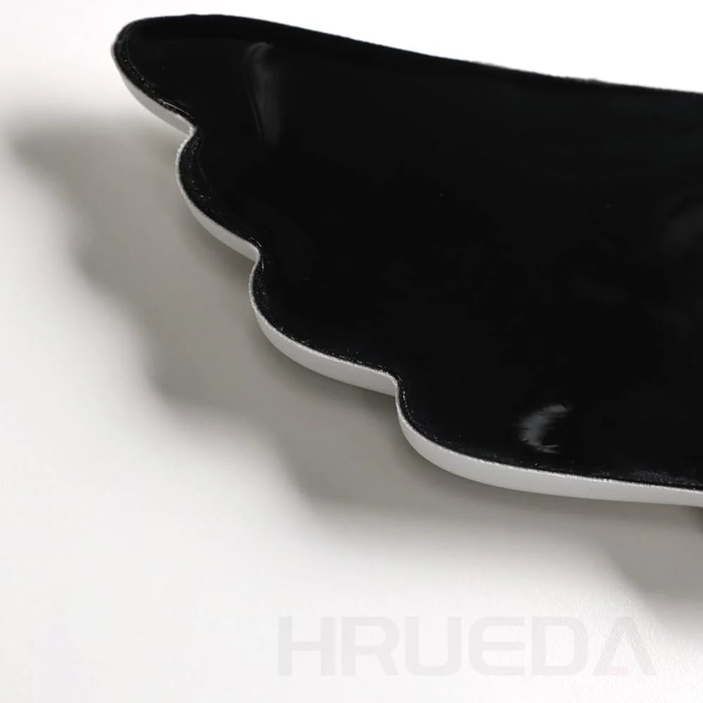 wing shaped wrist pad