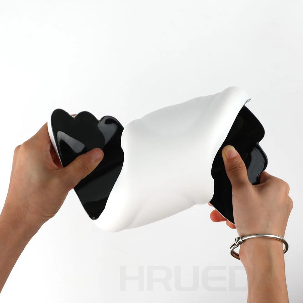 wing shaped wrist pad