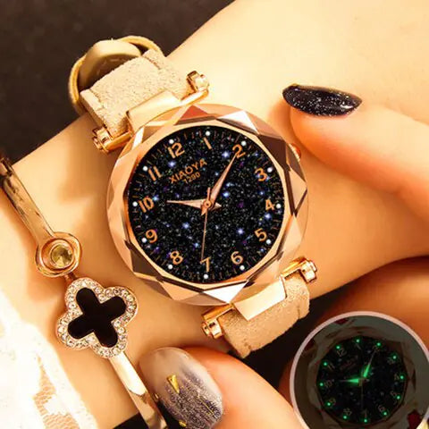 Reloj de cuarzo para mujer con diseño de estrellas luminosas