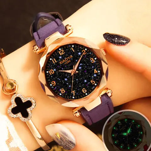 Reloj de cuarzo para mujer con diseño de estrellas luminosas